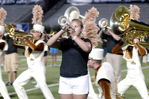 Marching band students participated in a special encore performance alongside Carolina Crown members.